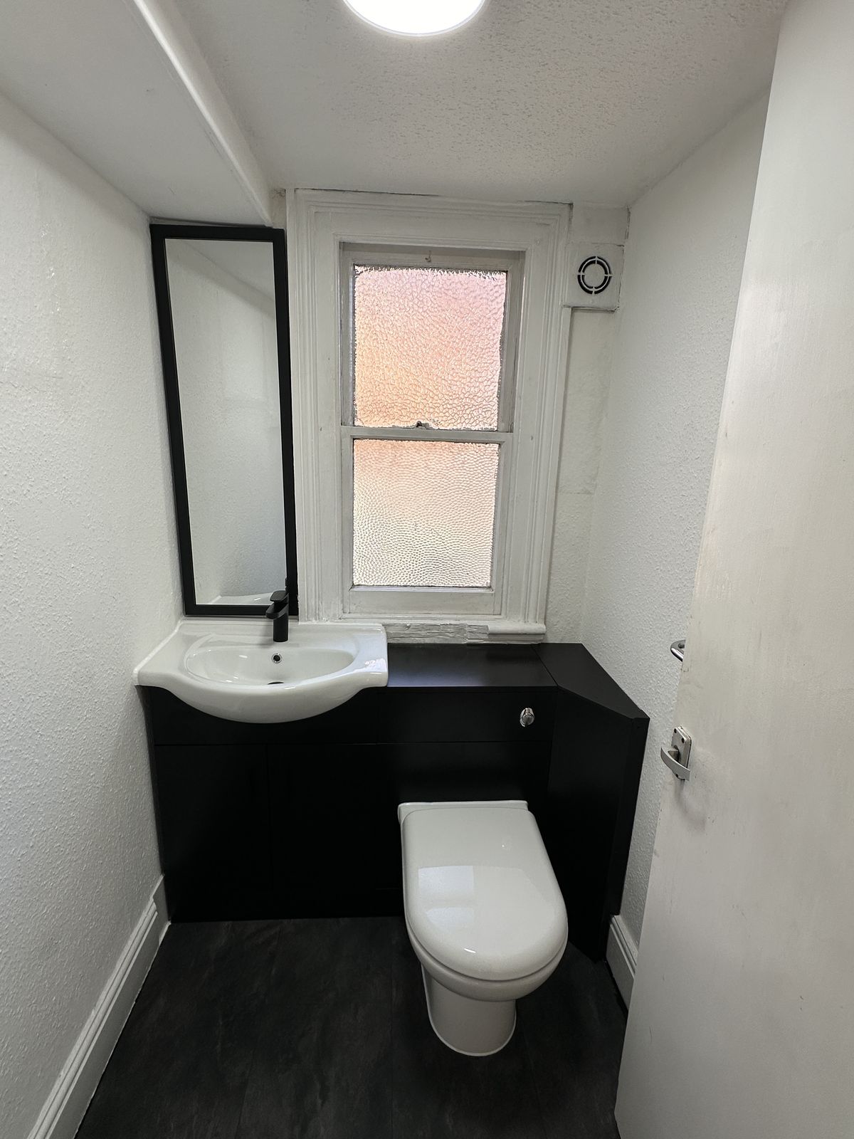 Cloakroom with bespoke vanity unit
